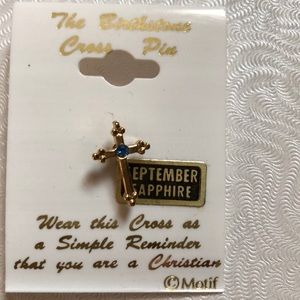 The birthstone cross pin